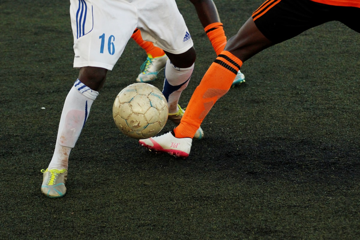 Two players challenging for the ball